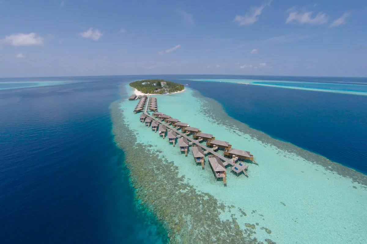Aerial view of Maldives tropical island resort with turquoise water
